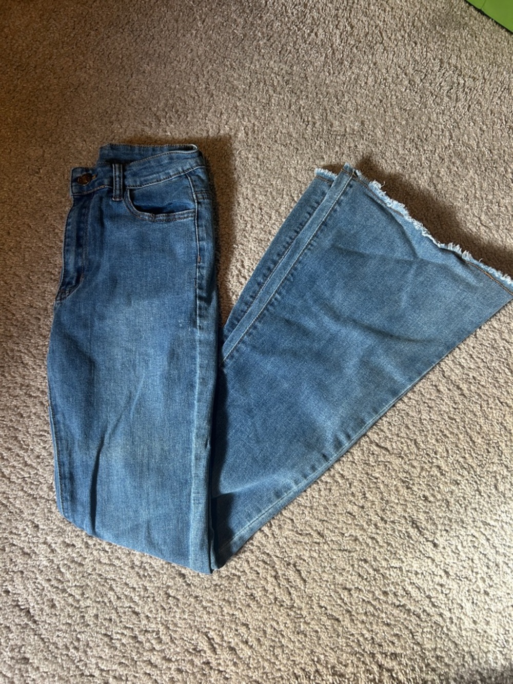 SHEIN Medium Blue High-Rise Flare Jeans with Frayed Hem